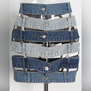 This denim skirt is perfect for fall and or summer styling. New, never worn!